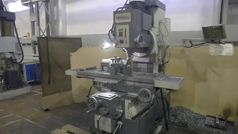 Milling machine cuts metal making part. Process of metalworking. Stadycam 스톡 동영상 129104964