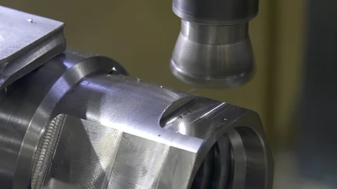 Milling machine cuts metal making part. Process of metalworking. Close-up Stock Footage 129105645