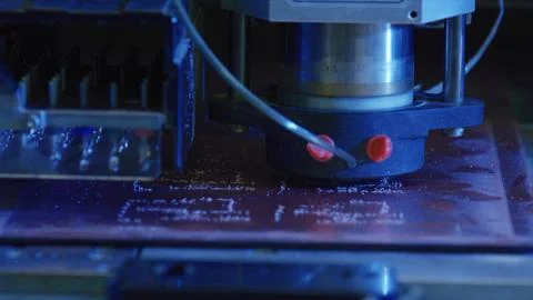 Milling machine engraving electronic circuit board in factory Stock Photos