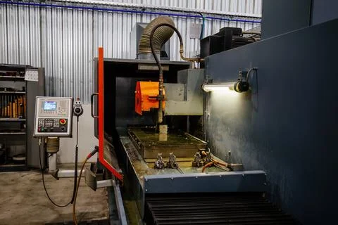 Milling machine with liquid coolant Stock Photos
