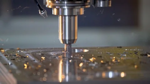 Milling machine in operation in a machine shop.  CNC metal manufacturing. Stock Footage 108675937