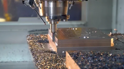 Milling machine in operation in a machine shop.  CNC metal manufacturing. Stock Footage 108678037