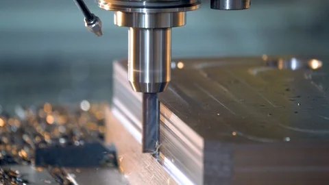 Milling machine in operation in a machine shop.  CNC metal manufacturing. Stock Footage 108680304