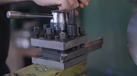 A milling machine operator prepares cutter to top jobs. fixing of the cutting Stock Footage 57688386