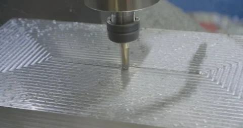 Milling machine processes aluminum workpiece Stock Footage 297579887