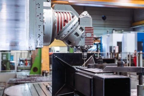 Milling machine robot working on workpiece Stock Photos