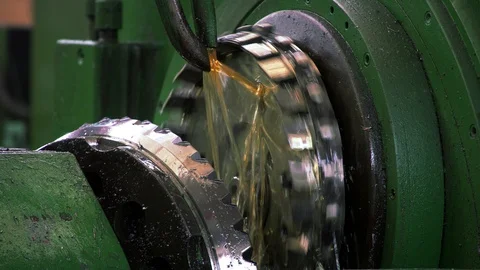 Milling machine at work, pours oil, the rotation of large mills Video stock 100654410