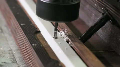 Milling machine in working condition, milling machine cuts a hole in the product Stock Footage 237236610