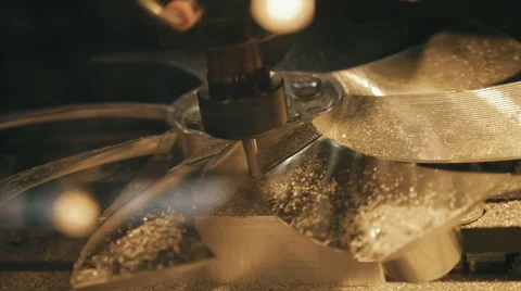 Milling machine works on the program and makes the fan from brass Stock Footage 68355637