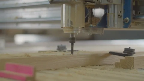 Milling process on computer numerical control machine in action in slow motion Stock Footage 124707380