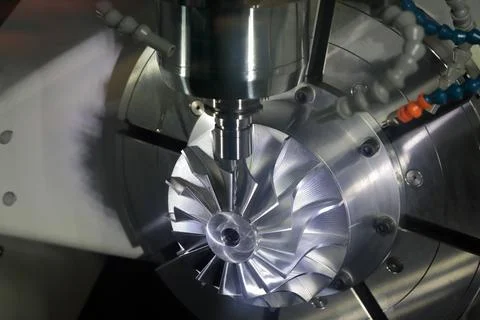 Milling process using 5-axis CNC machining center Foto stock