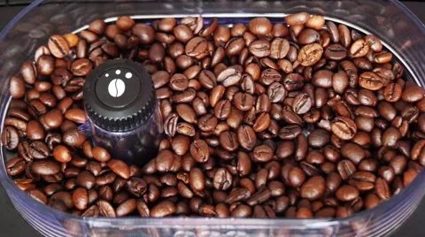 Milling of Roasted Coffee Beans in Grinder Stock Footage 47597400