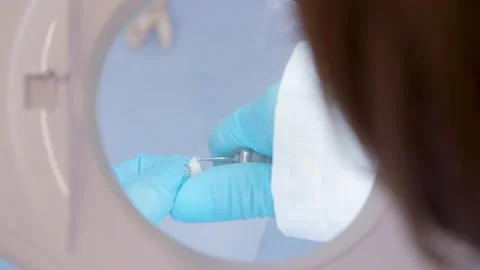 Milling a Teeth / Examination / Forensic Stock Footage 145056023