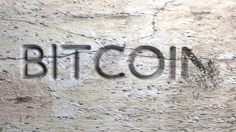 Milling text Bitcoin in a stone wall. 3D rendering. Stock Footage 99295293