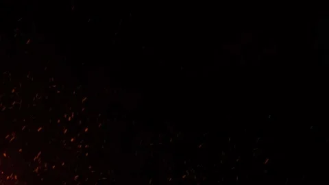 A million sparks with fire particles falling down the sky and circling in the Stock Footage 199403480