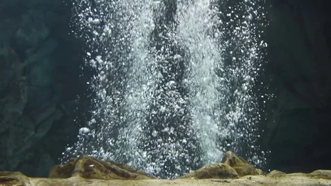 Millions of bubbles float upward in water Stock Footage 78069501