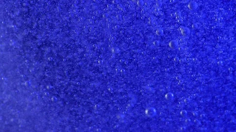 Millions of tiny bubbles rise in a deep blue current, this is very 스톡 동영상 126144688