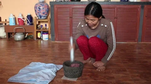 Millstone pounding meat, making daily dish Stock Footage 49708839