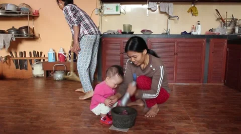 Millstone pounding meat, making daily dish Stock Footage 49708853