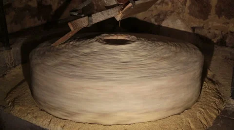 Millstone in a watermill grinds corn  2 of 7 Stock Footage 54563402