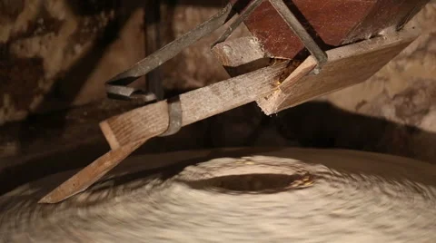 Millstone in a watermill grinds corn  3 of 7 Stock Footage 54592460