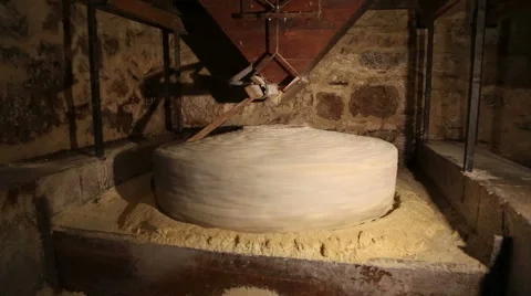 Millstone in a watermill grinds corn  4 of 7 Stock Footage 54593705