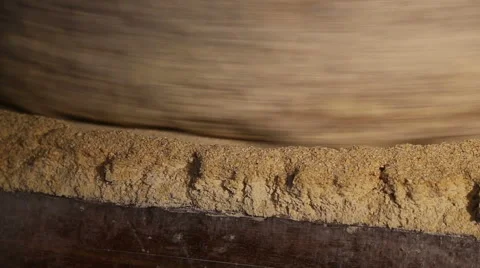 Millstone in a watermill grinds corn  5 of 7 Stock Footage 54608829