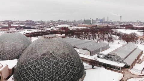 Milwaukee Domes covered in snow during a freezing Wisconsin winter downtown Stock Footage 156367737