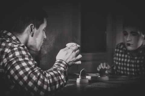 Mime applying make-up Stock Photos