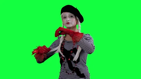 The mime drinks tea from a cup invisible Stock Footage 45395205