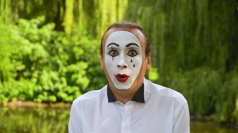 Mime on the park shows pantomime. Emotio... | Stock Video | Pond5