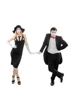 Mimes leaning on imaginary objects. Two professional actors Stock Photos