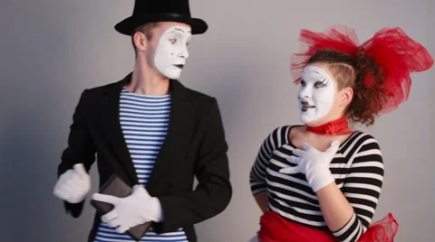 Mimes looking at tablet pc Stock Footage 59549190