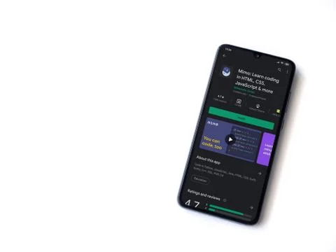 Mimo - Learning coding app play store page on the display of a black mobile s Stock Photos