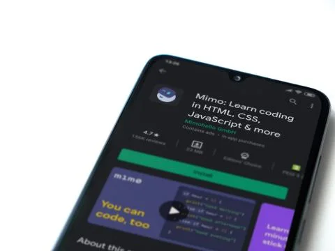 Mimo - Learning coding app play store page on the display of a black mobile s Stockfoto's