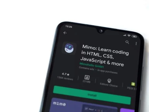 Mimo - Learning coding app play store page on the display of a black mobile s Stock Photos