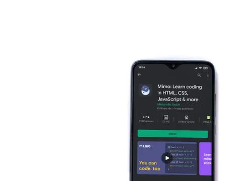 Mimo - Learning coding app play store page on the display of a black mobile s Stock Photos