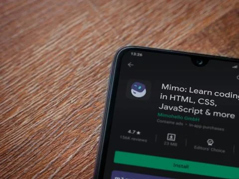 Mimo - Learning coding app play store page on the display of a black mobile s Foto stock