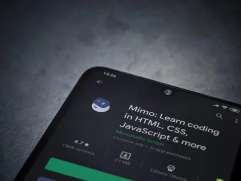 Mimo - Learning coding app play store page on the display of a black mobile s Stock Photos