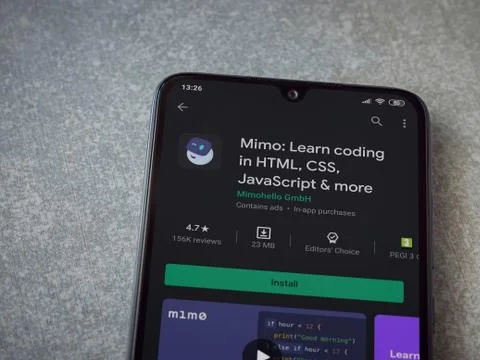 Mimo - Learning coding app play store page on the display of a black mobile s Stock Photos