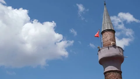 Minaret and clouds, clouds and sky behind mosque minaret Stock Footage 161359609