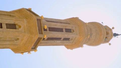 Minaret of the mosque. Vertical 4k close-up video view from below on a high Stock-Footage 230410836