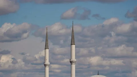 Minarets of mosque and clouds in time lapse clip Stock Footage 131381581