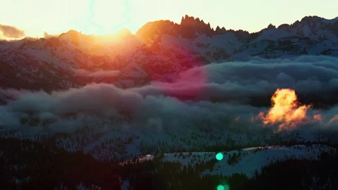 Minarets Vista spring sunset rays Mammoth Mountain Ski Resort California aerial Stock Footage 307158932