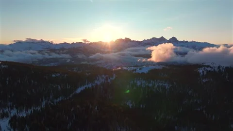 Minarets Vista spring sunset rays Mammoth Mountain Ski Resort California aerial Stock Footage 307158944