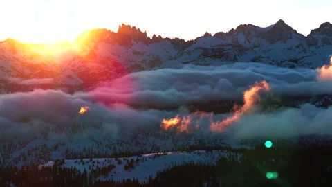 Minarets Vista spring sunset rays Mammoth Mountain Ski Resort California aerial Stock Footage 307158956