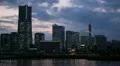 Minato Mirai 21 Yokohama Skyline Office Buildings Ferris Wheel Dusk Night Light HD Footage