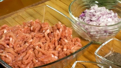 Minced beef in a transparent bowl. Stock Footage 110637752