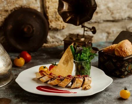Minced beef wrap in crepe, served with crispy flatbread and fresh herbs Stock Photos