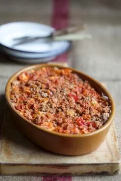 A minced meat bake with chilli and tomatoes Stock Photos